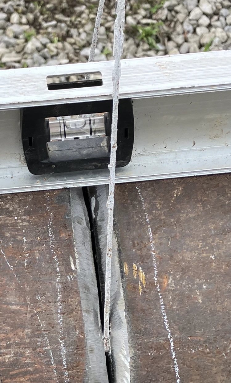 Level check on welded steel